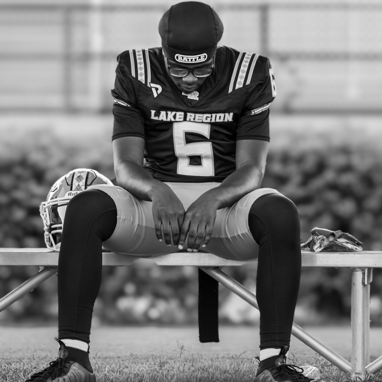 Lake Region football player wearing a black jersey with the white PROVYN chest logo
